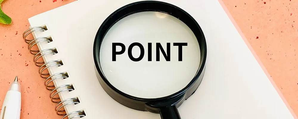 虫眼鏡の中にポイントと書いてある画像
