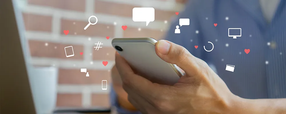 スマホとSNSアイコンのイメージ画像